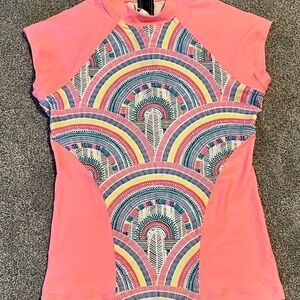 Women peach pink top with zipper back by Rip Curl.